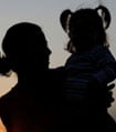 Silhouette picture of mother and daughter